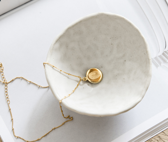 Necklace inside a bowl